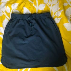 Lululemon size 12 skirt. Grey with small stains.